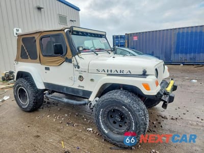 Czwarte zdjęcie samochodu z boku: 1999 JEEP WRANGLER / TJ SAHARA VIN:1J4FY49S9XP465466 - miniatura