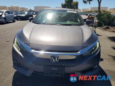 Piąte zdjęcie samochodu w środku: 2017 HONDA CIVIC TOURING VIN:2HGFC3B95HH356371 - miniatura