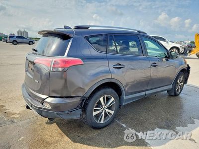 Trzecie zdjęcie samochodu z tyłu: 2017 TOYOTA RAV4 XLE VIN:JTMWFREV9HJ710568 - miniatura