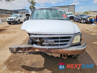 Piąte zdjęcie samochodu w środku: 2001 FORD F150 VIN:1FTZF172X1NB05037 - miniatura