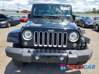 Piąte zdjęcie samochodu w środku: 2017 JEEP WRANGLER UNLIMITED SAHARA VIN:1C4HJWEG7HL722701 - miniatura