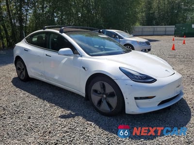 Czwarte zdjęcie samochodu z boku: 2018 TESLA MODEL 3 VIN:5YJ3E1EA2JF161779 - miniatura