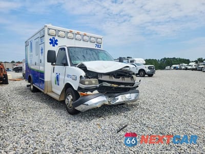 Czwarte zdjęcie samochodu z boku: 2014 CHEVROLET EXPRESS G4500 VIN:1GB6G5CL5E1157862 - miniatura