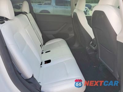 Zdjęcie 10 z 12 samochodu: 2023 TESLA MODEL Y VIN:7SAYGDEE7PF817233 - miniatura