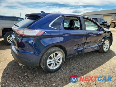 Trzecie zdjęcie samochodu z tyłu: 2016 FORD EDGE SEL VIN:2FMPK4J82GBC10477 - miniatura