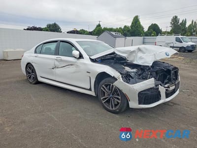 Czwarte zdjęcie samochodu z boku: 2022 BMW 745XE VIN:WBA7W4C08NCJ44060 - miniatura