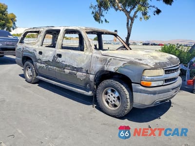 Czwarte zdjęcie samochodu z boku: 2001 CHEVROLET SUBURBAN K1500 VIN:3GNFK16T01G205317 - miniatura