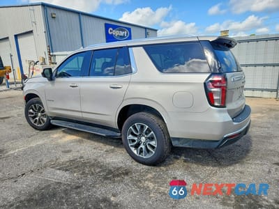 Drugie zdjęcie samochodu z przodu: 2021 CHEVROLET TAHOE C1500 LT VIN:1GNSCNKD0MR410609 - miniatura