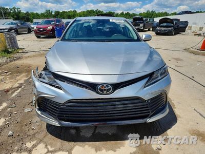 Piąte zdjęcie samochodu w środku: 2021 TOYOTA CAMRY LE VIN:4T1C11AK9MU497754 - miniatura
