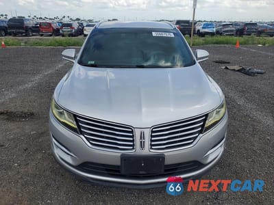 Piąte zdjęcie samochodu w środku: 2015 LINCOLN MKC VIN:5LMCJ1A96FUJ18223 - miniatura
