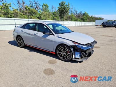 Czwarte zdjęcie samochodu z boku: 2022 HYUNDAI ELANTRA N BASE VIN:KMHLW4AK8NU005302 - miniatura