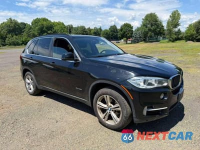 Czwarte zdjęcie samochodu z boku: 2015 BMW X5 XDRIVE35I VIN:5UXKR0C56F0P00070 - miniatura
