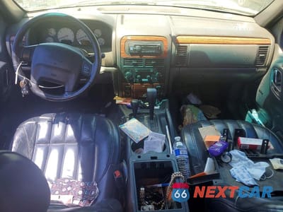 Zdjęcie 8 z 13 samochodu: 1999 JEEP GRAND CHEROKEE LIMITED VIN:1J4GW68N5XC696289 - miniatura
