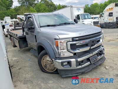 Czwarte zdjęcie samochodu z boku: 2022 FORD F550 SUPER DUTY VIN:1FDUF5GN4NDA13103 - miniatura