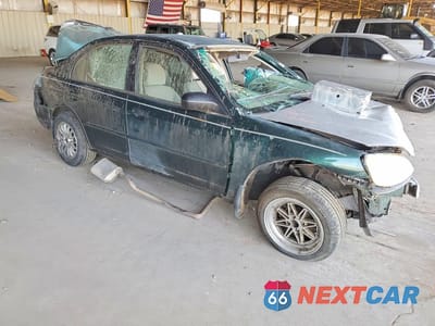 Czwarte zdjęcie samochodu z boku: 2001 HONDA CIVIC LX VIN:JHMES16571S008271 - miniatura