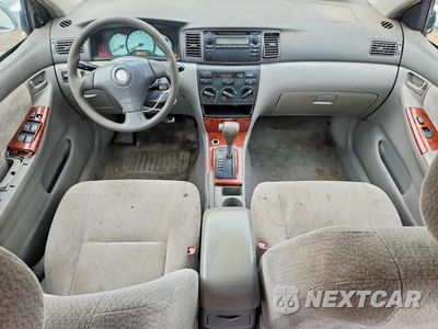 Zdjęcie 8 z 12 samochodu: 2003 TOYOTA COROLLA LE VIN:JTDBR32E132013051 - miniatura