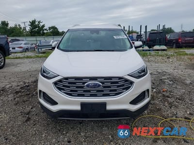 Piąte zdjęcie samochodu w środku: 2019 FORD EDGE TITANIUM VIN:2FMPK3K93KBB52390 - miniatura