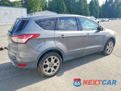 Trzecie zdjęcie samochodu z tyłu: 2013 FORD ESCAPE SEL VIN:1FMCU9H90DUB01820 - miniatura