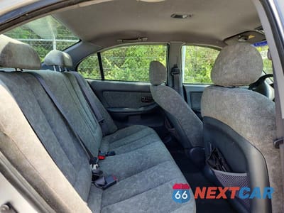 Zdjęcie 10 z 12 samochodu: 2003 HYUNDAI ELANTRA GLS VIN:KMHDN45D23U680045 - miniatura