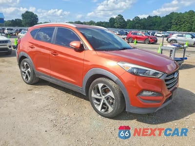 Czwarte zdjęcie samochodu z boku: 2016 HYUNDAI TUCSON SPORT VIN:KM8J33A2XGU112140 - miniatura