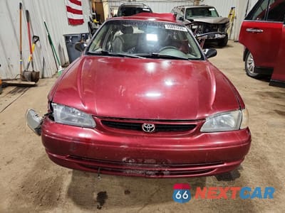 Piąte zdjęcie samochodu w środku: 1999 TOYOTA COROLLA VIN:1NXBR12E7XZ234759 - miniatura