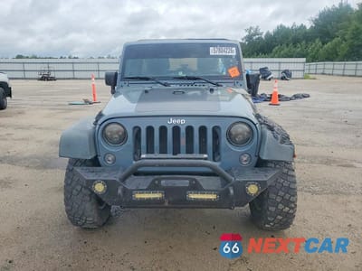 Piąte zdjęcie samochodu w środku: 2015 JEEP WRANGLER UNLIMITED RUBICON VIN:1C4BJWFG2FL620823 - miniatura
