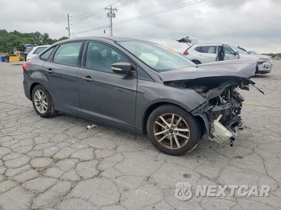Czwarte zdjęcie samochodu z boku: 2016 FORD FOCUS SE VIN:1FADP3F26GL303385 - miniatura