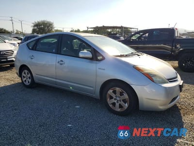 Czwarte zdjęcie samochodu z boku: 2007 TOYOTA PRIUS BASE VIN:JTDKB20U977614127 - miniatura