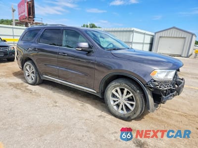 Czwarte zdjęcie samochodu z boku: 2014 DODGE DURANGO LIMITED VIN:1C4RDJDG0EC318862 - miniatura