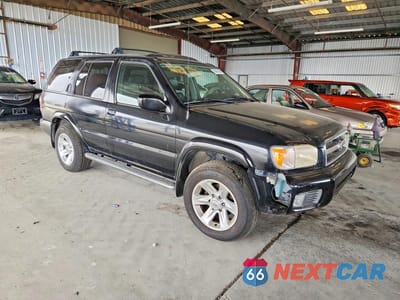 Czwarte zdjęcie samochodu z boku: 2002 NISSAN PATHFINDER SE VIN:JN8DR09Y22W722932 - miniatura