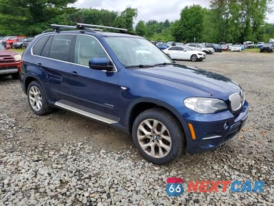 Czwarte zdjęcie samochodu z boku: 2013 BMW X5 XDRIVE35I VIN:5UXZV4C53D0B16176 - miniatura