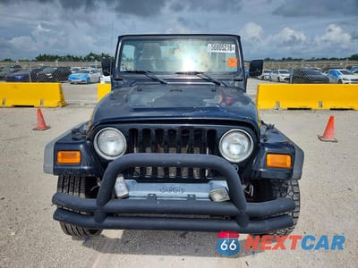 Piąte zdjęcie samochodu w środku: 2004 JEEP WRANGLER / TJ RUBICON VIN:1J4FA69S44P728717 - miniatura