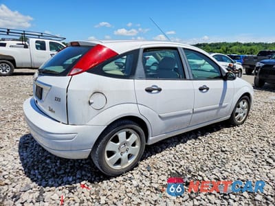 Trzecie zdjęcie samochodu z tyłu: 2002 FORD FOCUS ZX5 VIN:3FAFP37342R166022 - miniatura
