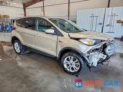 Czwarte zdjęcie samochodu z boku: 2017 FORD ESCAPE SE VIN:1FMCU9GD3HUA67481 - miniatura
