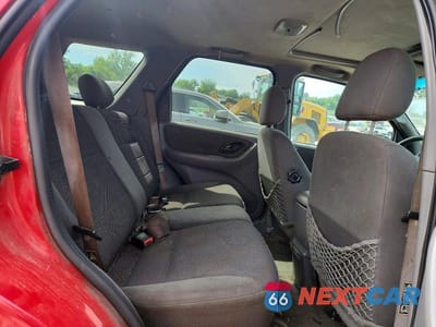 Zdjęcie 11 z 13 samochodu: 2002 FORD ESCAPE XLT VIN:1FMYU03182KA43242 - miniatura