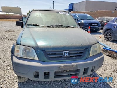 Piąte zdjęcie samochodu w środku: 1999 HONDA CR-V LX VIN:JHLRD1844XC020000 - miniatura