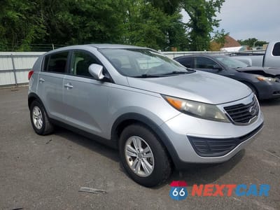 Czwarte zdjęcie samochodu z boku: 2011 KIA SPORTAGE LX VIN:KNDPB3A22B7082141 - miniatura