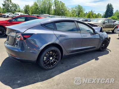 Trzecie zdjęcie samochodu z tyłu: 2023 TESLA 3 VIN:5YJ3E1EA3PF474249 - miniatura