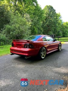 Czwarte zdjęcie samochodu z boku: 1996 FORD MUSTANG GT VIN:1FALP42XXTF190133 - miniatura