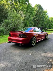 Czwarte zdjęcie samochodu z boku: 1996 FORD MUSTANG GT VIN:1FALP42XXTF190133 - miniatura