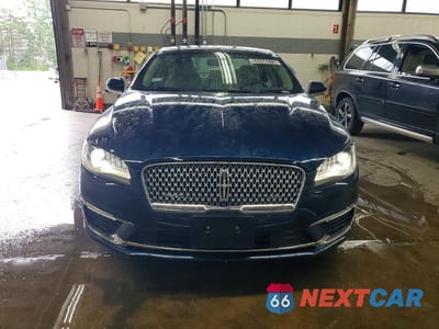 Piąte zdjęcie samochodu w środku: 2017 LINCOLN MKZ PREMIERE VIN:3LN6L5A98HR647961 - miniatura