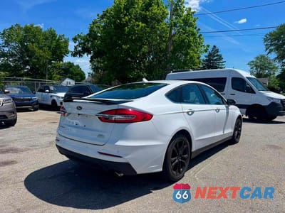 Czwarte zdjęcie samochodu z boku: 2020 FORD FUSION SEL VIN:3FA6P0CDXLR117972 - miniatura