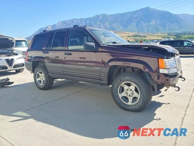 Czwarte zdjęcie samochodu z boku: 1998 JEEP GRAND CHEROKEE VIN:1J4GZ58S9WC242603 - miniatura