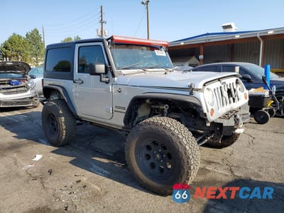 Czwarte zdjęcie samochodu z boku: 2011 JEEP WRANGLER SPORT VIN:1J4AA2D1XBL548163 - miniatura
