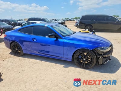Czwarte zdjęcie samochodu z boku: 2022 BMW M440I VIN:WBA83AP03NCJ02319 - miniatura