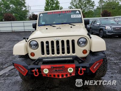 Piąte zdjęcie samochodu w środku: 2011 JEEP WRANGLER UNLIMITED SAHARA VIN:1J4HA5H15BL627167 - miniatura
