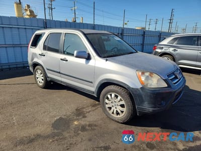 Czwarte zdjęcie samochodu z boku: 2005 HONDA CR-V EX VIN:JHLRD788X5C053053 - miniatura