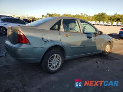 Trzecie zdjęcie samochodu z tyłu: 2006 FORD FOCUS ZX4 VIN:1FAHP34N66W177377 - miniatura
