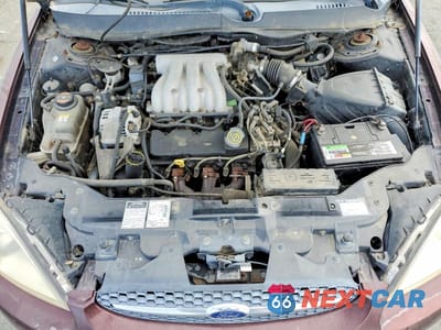 Zdjęcie 11 z 12 samochodu: 2000 FORD TAURUS SES VIN:1FAFP5525YG146528 - miniatura