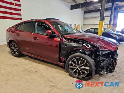 Czwarte zdjęcie samochodu z boku: 2026 BMW X6 XDRIVE40I VIN:5UX33EX03T9249415 - miniatura